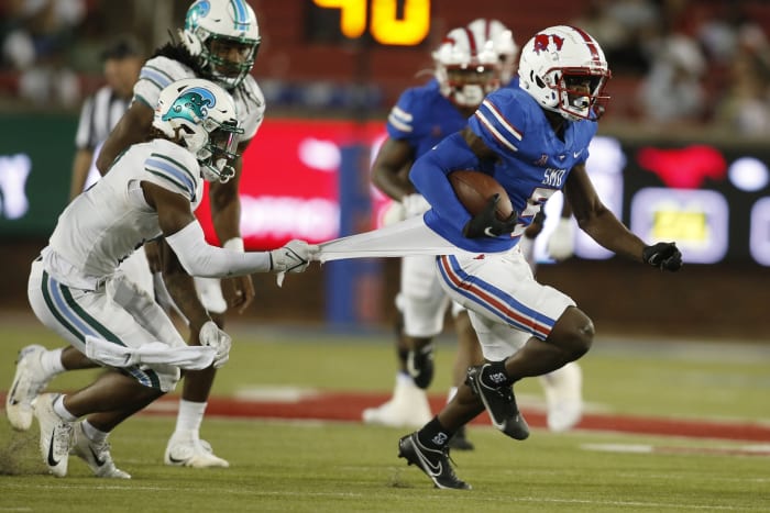 Southern Methodist receiver Danny Gray (5) breaks past Tulane Green Wave linebacker Dorian Williams (2). Mandatory Credit: Tim Heitman-USA TODAY Sports